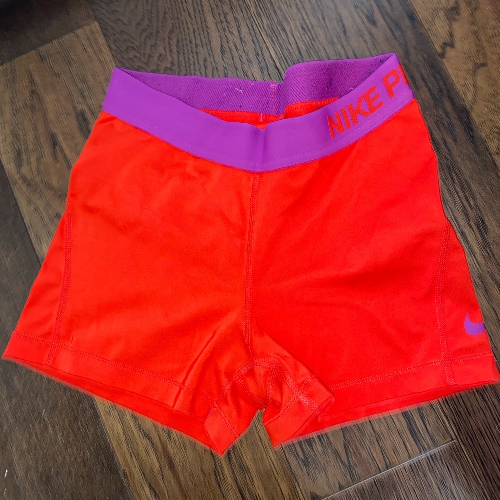 Bright red nike pros